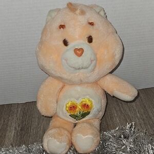 Care Bears Orange Plush Stuffed Animal with Sunflower Badge